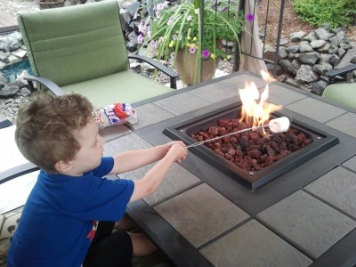 Propane Fire Pit Table Becomes A Charcoal Grilling Table